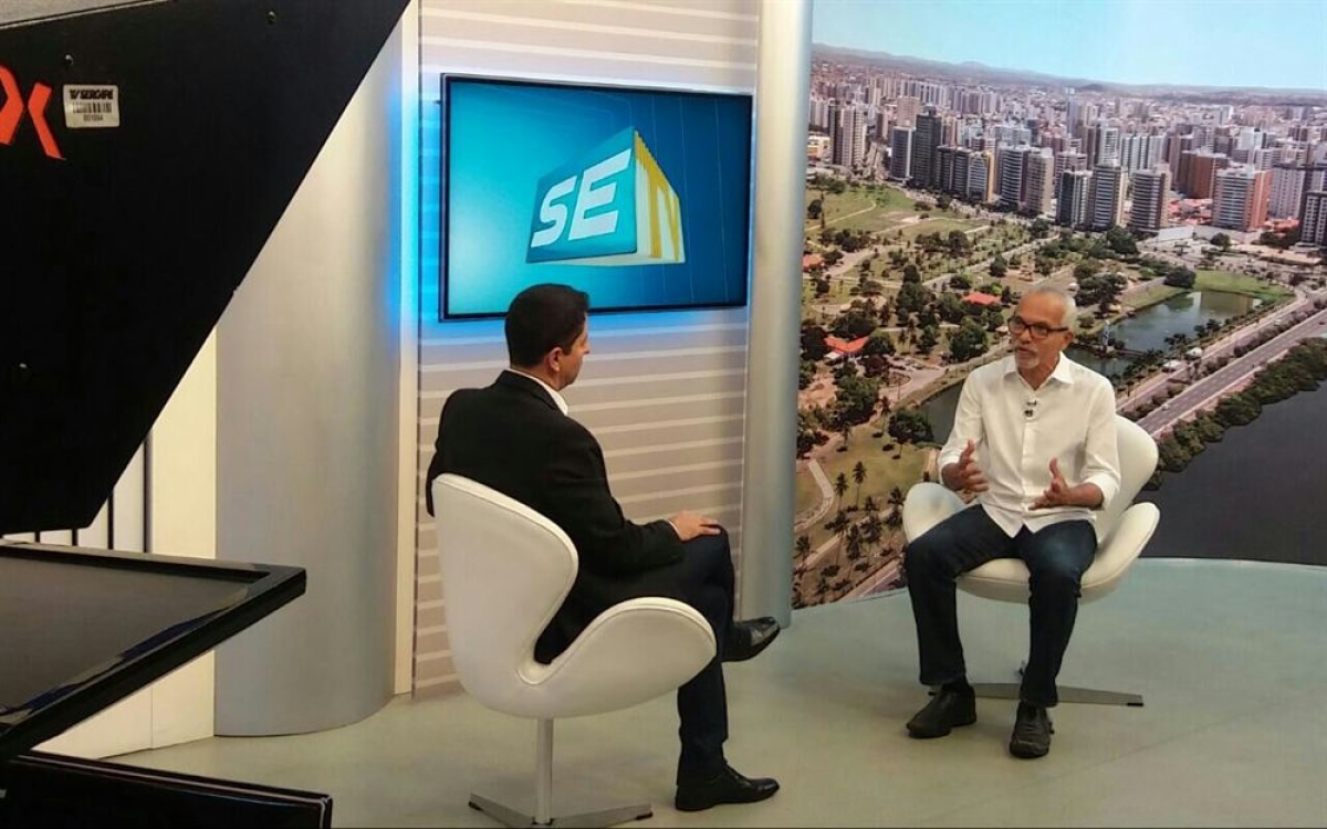 Jornalista Ricardo Marques/TV Sergipe e Edvaldo Nogueira (Foto: Valter Lima)