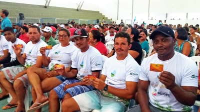 Mão Amiga: agricultores da laranja de Boquim, Salgado e Lagarto recebem senha e cartão (Foto: Comunicação SEIDH )