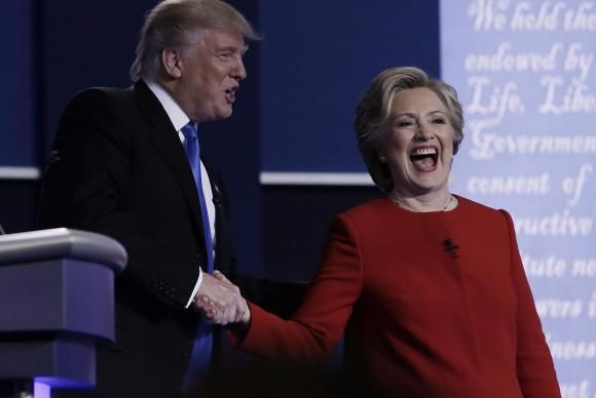 Os candidatos  presidncia norte-americana o republicano Donald Trump e democrata Hillary Clinton, em debate televisivo (Imagem: Rick Wilking/EPA/Agncia Lusa)