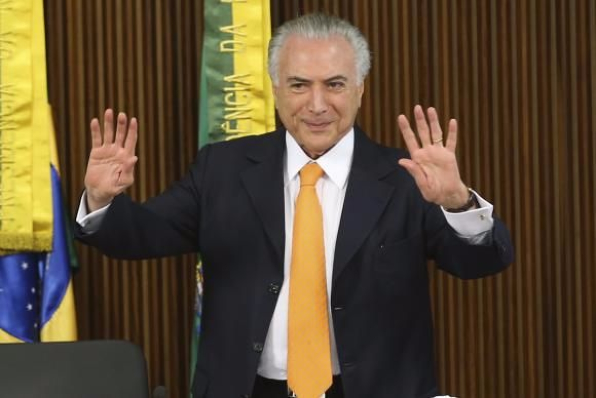 Michel Temer diz que vai combater verses que circulam nas ruas e redes sociais sobre retirada de direitos trabalhista (Imagem: Antonio Cruz/Agncia Brasil)